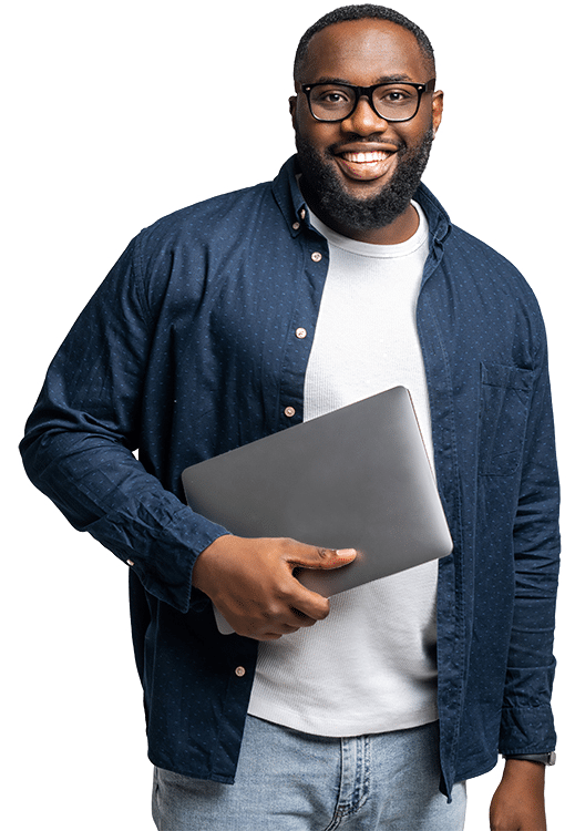 The image shows a confident, smiling man holding a laptop, dressed in casual professional attire, symbolizing expertise and approachability. It complements the message of Stafford Technologies being a reliable partner in building successful websites by representing a knowledgeable and personable team member.