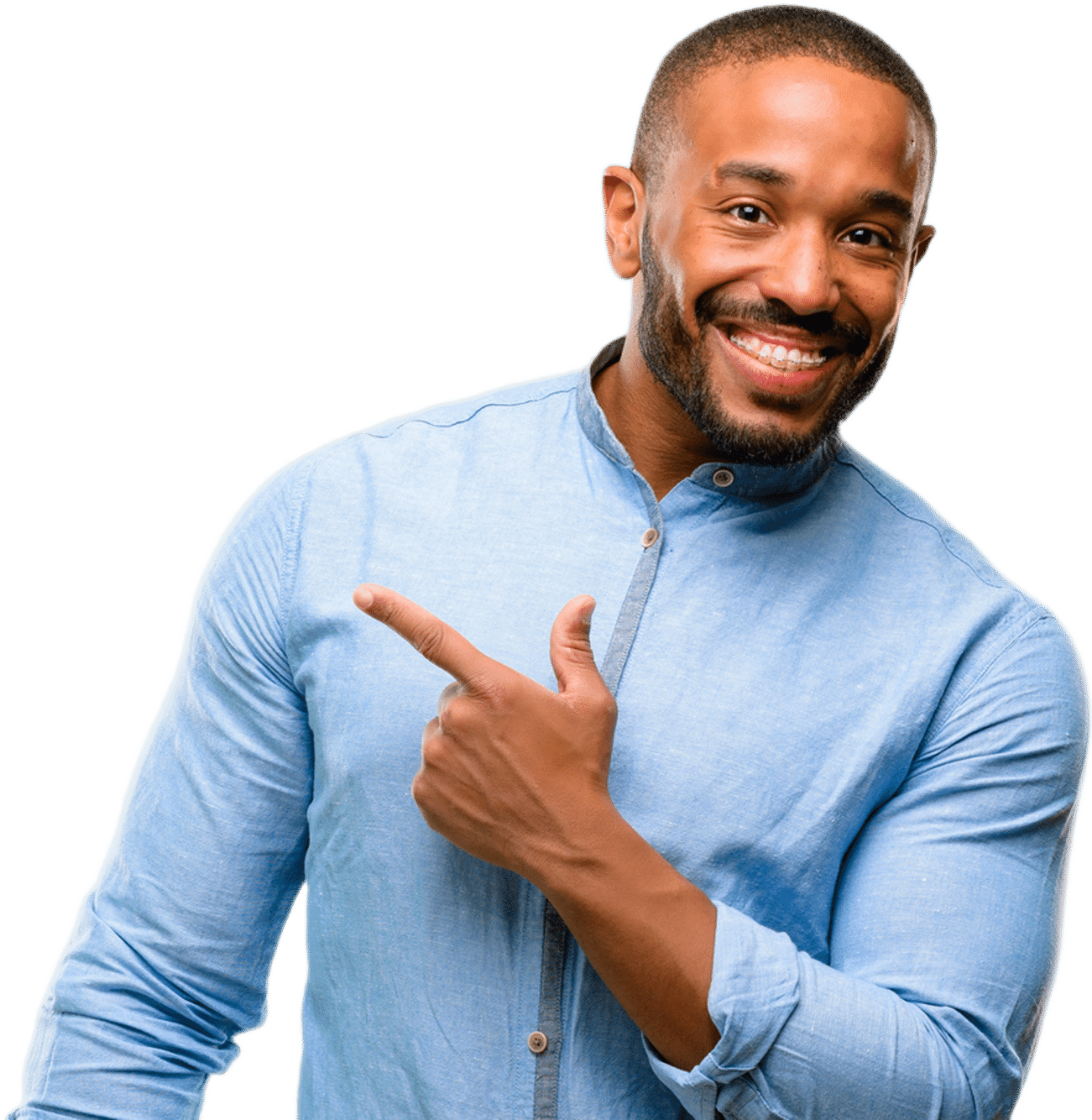 A smiling man in a light blue shirt pointing to the side against a black background. His expression is cheerful and inviting, suggesting enthusiasm and positivity.