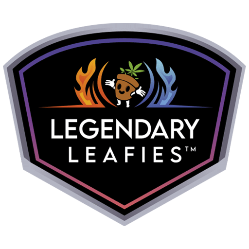 The image showcases the logo for Legendary Leafies, a Stafford Technologies customer. The design features a shield-shaped emblem with a cheerful cannabis-themed character at the center, surrounded by stylized flames and waves in orange and blue, representing balance and diversity. The bold white text emphasizes the brand's mission to destigmatize cannabis through engaging and educational characters, making information about the plant's benefits fun and accessible.