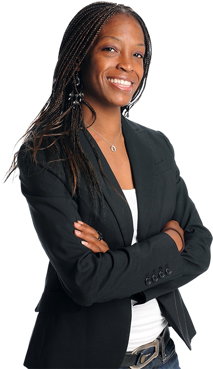 This image features a confident woman wearing a professional black blazer, with her arms crossed and a friendly smile. It conveys a sense of professionalism and approachability, complementing the context of a service aimed at small businesses in professional fields. The image aligns with the idea of trust and expertise.