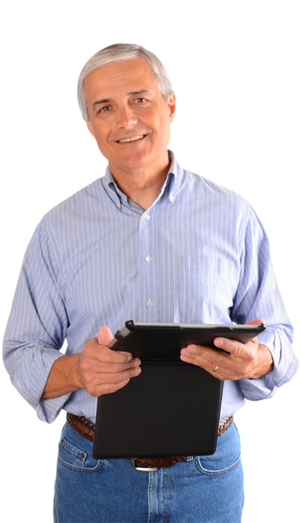 This image shows an older man with gray hair, dressed in a light blue striped shirt and jeans, holding a tablet with a cover. He is smiling warmly, suggesting a friendly and professional demeanor. The image appears to be used to represent approachable customer service or professionalism, potentially for a service company, as indicated by the context mentioning "Service Company Websites by Stafford Technologies."