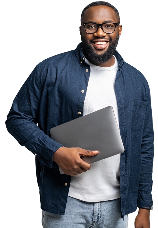 The image shows a confident, smiling man holding a laptop, dressed in casual professional attire, symbolizing expertise and approachability. It complements the message of Stafford Technologies being a reliable partner in building successful websites by representing a knowledgeable and personable team member.